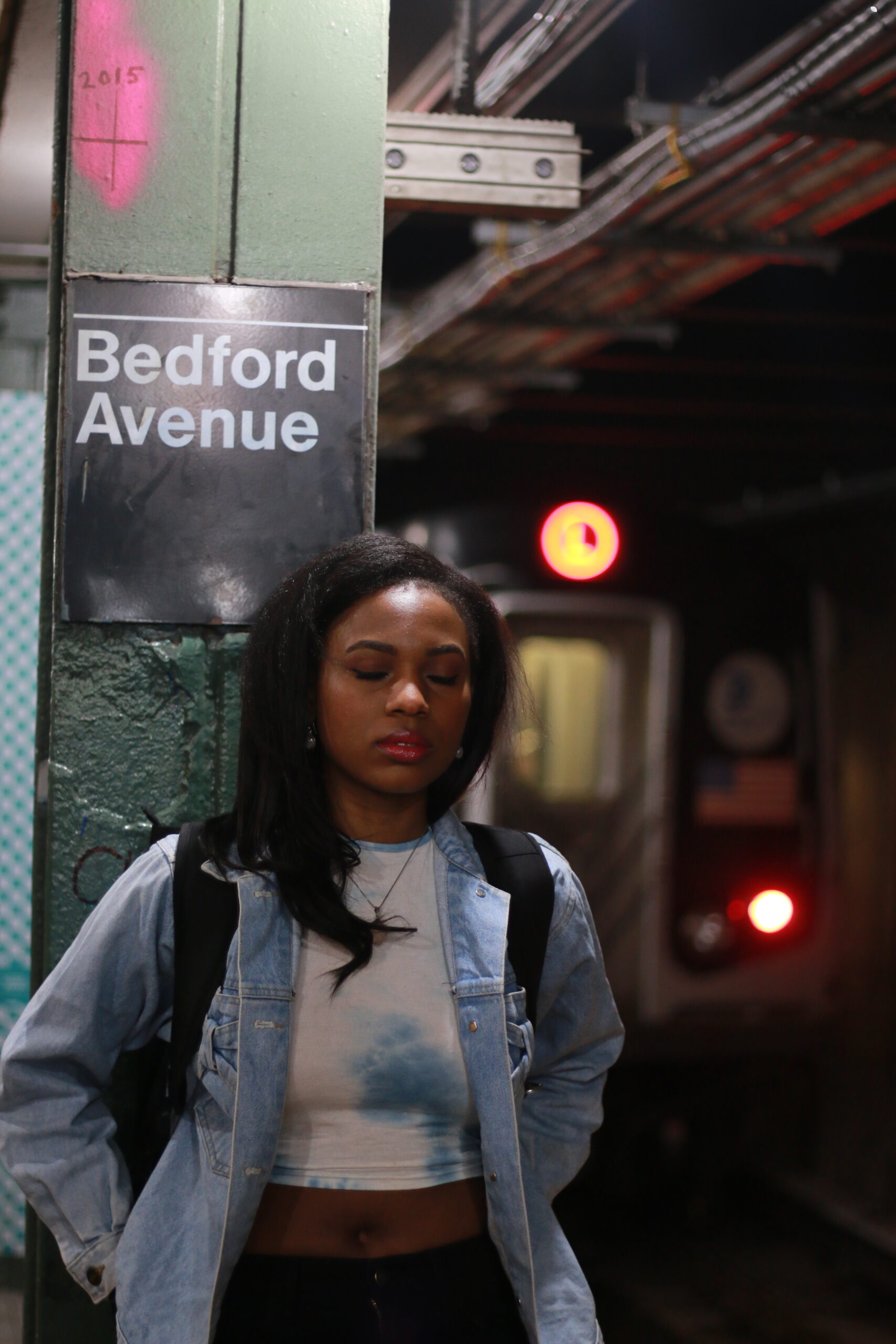 Bedford Ave train station in NYC with Black woman model.